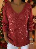 María — The festive V-neck jumper to shine during Christmas